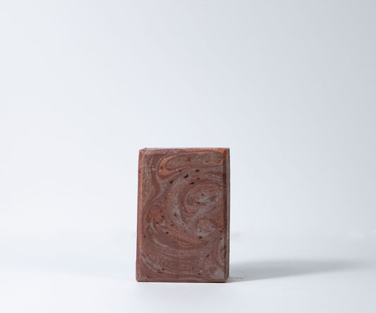 Crazy Goat Soaps patchouli and orange essential goat milk soap bar offers a rich, earthy, and citrusy scent while deeply nourishing and revitalizing the skin.